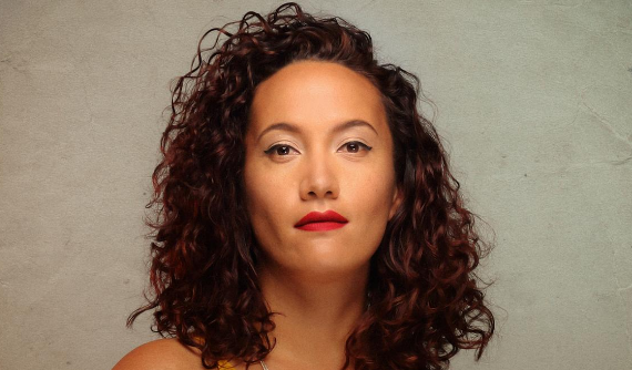 Head and shoulders of Ria Hall